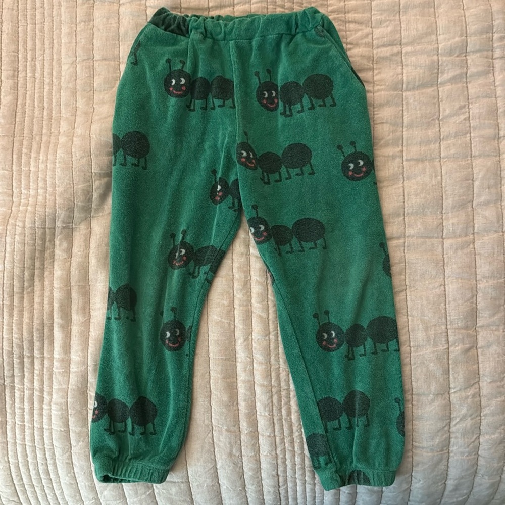 HUGO LOVES TIKI Green Joggers with caterpillars with Elastic Cuffs